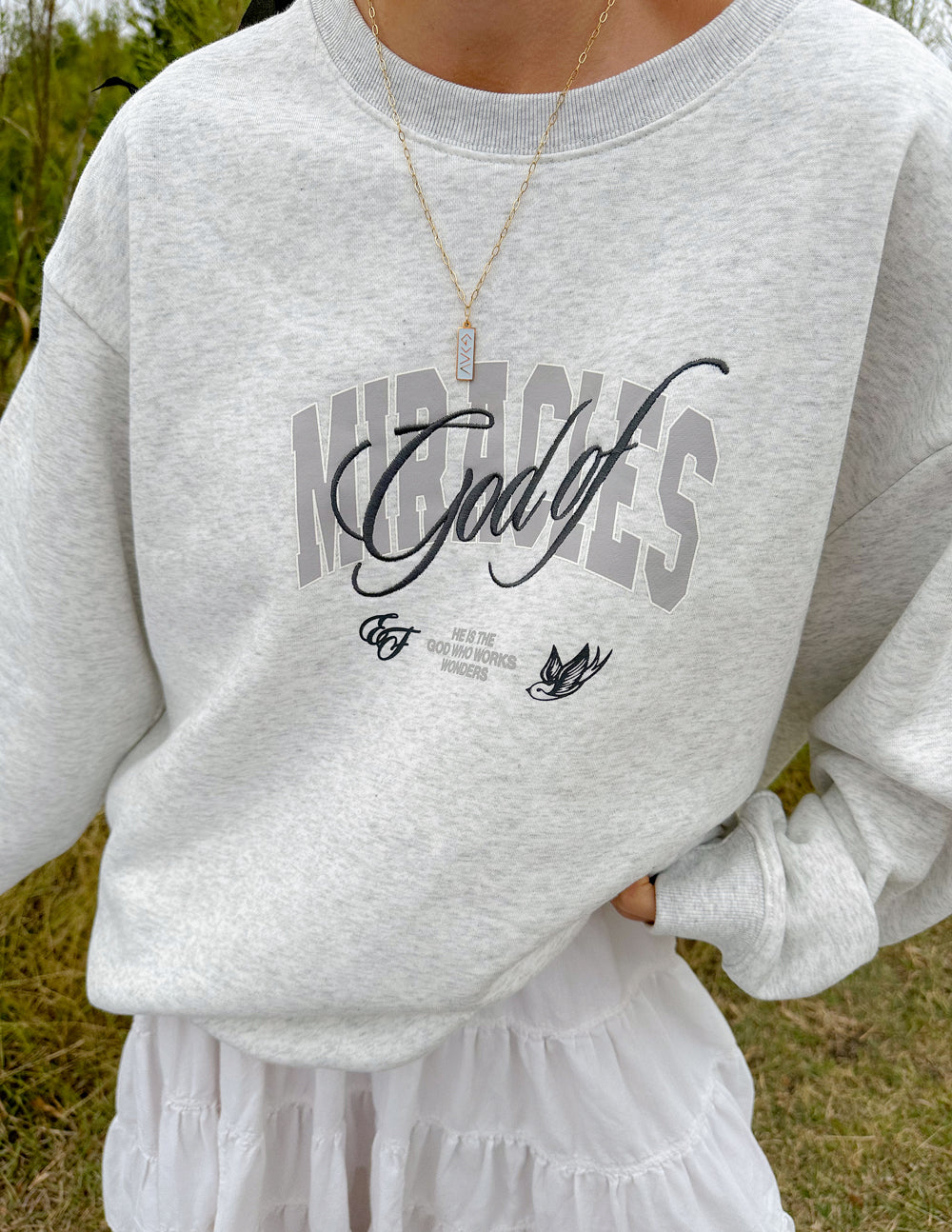 Elevated Faith Christian Crewneck Sweatshirt in light gray with Miracles graphic design