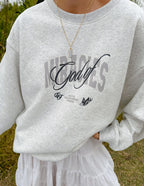 Elevated Faith Christian Crewneck Sweatshirt in light gray with Miracles graphic design