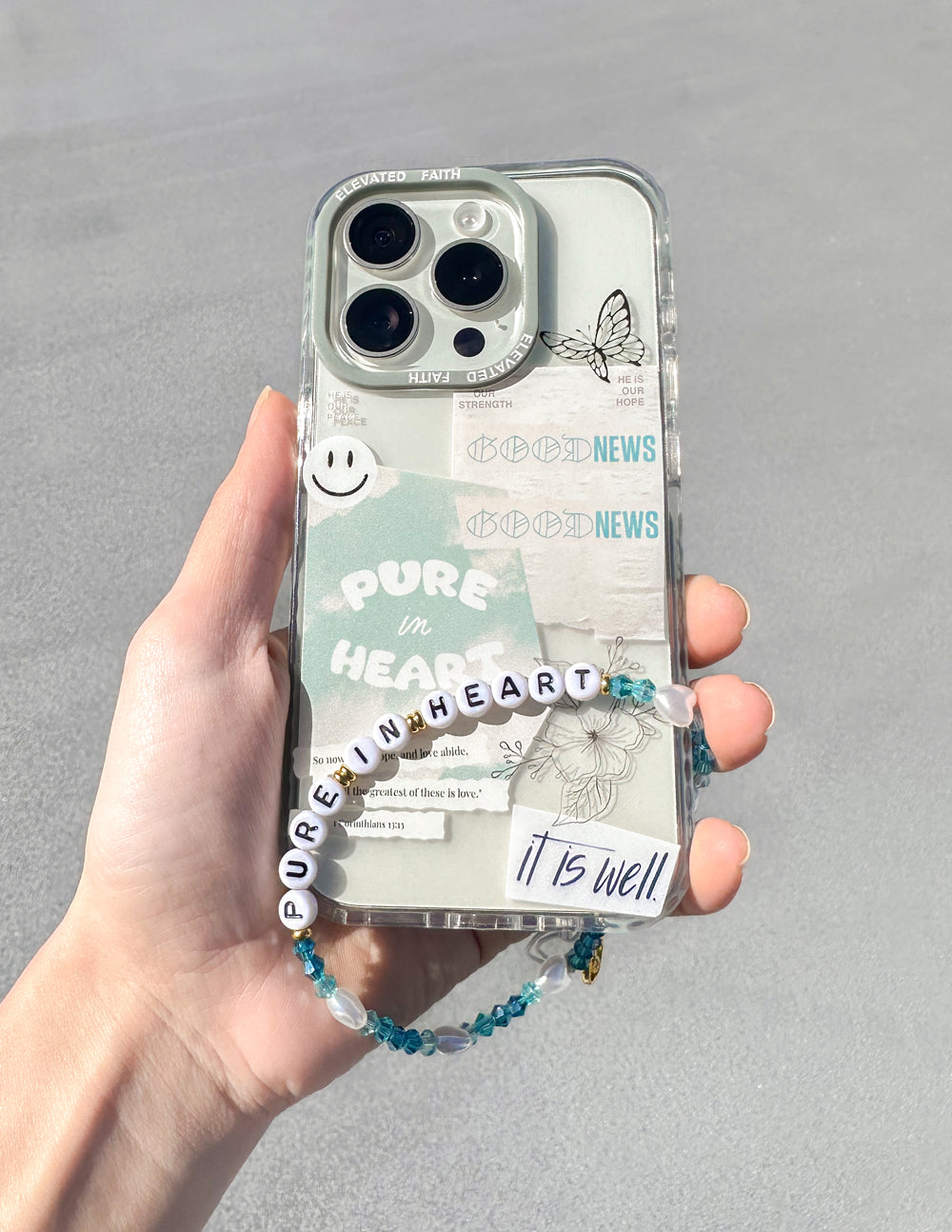 Elevated Faith Christian iPhone Case with Pure in Heart design and colorful wrist strap