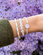 Elevated Faith Christian Jewelry Bracelet with bead letters spelling grace and pastel colors on a wrist