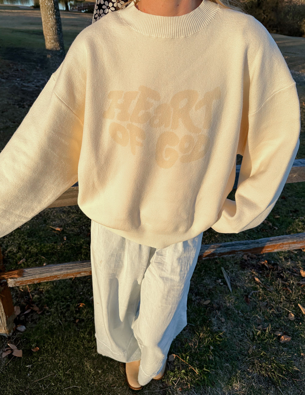 Cream Elevated Faith Christian Crewneck Sweatshirt with Heart of God design for casual wear