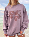 Elevated Faith Christian Crewneck Sweatshirt featuring 'Heart of God' graphic design in purple