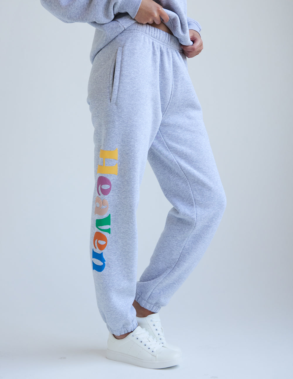 Elevated Faith gray sweatpants featuring colorful 'Heaven' design, perfect for Christian Apparel enthusiasts