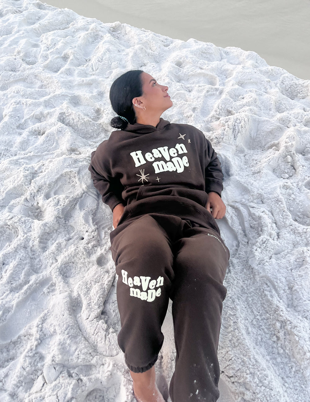 Elevated Faith Christian Apparel brown sweatpants and hoodie with 'Heaven maybe' graphic for casual wear