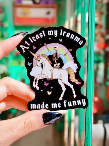 Funny Black unicorn sticker with rainbow halo, skeleton figure, held by fingers