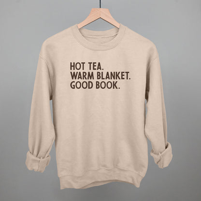 Hot Tea, Warm Blanket, Good Book Cozy graphic crewneck sweatshirt in Light Sandstone