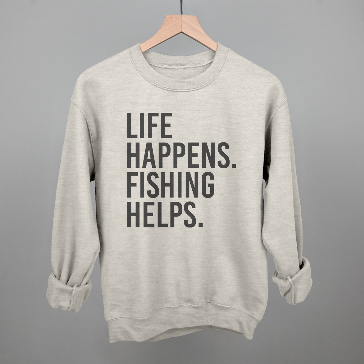 Life Happens Fishing Helps graphic crewneck sweatshirt in Oatmeal