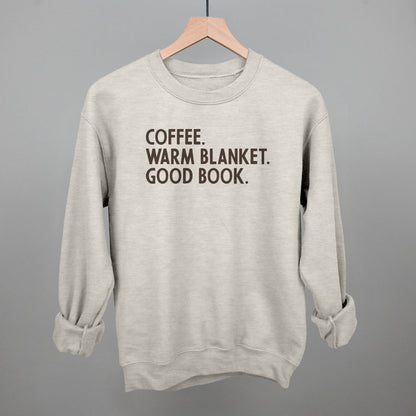Coffee, Warm Blanket, Good Book Cozy graphic crewneck sweatshirt in Oatmeal