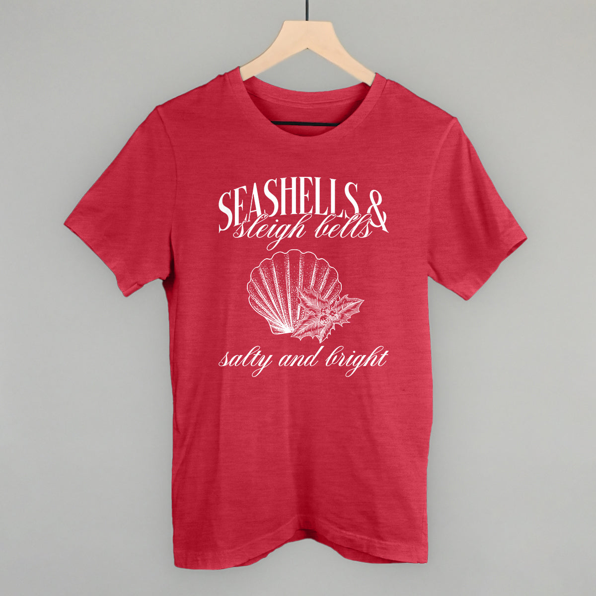 Seashells & Sleigh Bells Coastal Christmas graphic tee in Heather Red