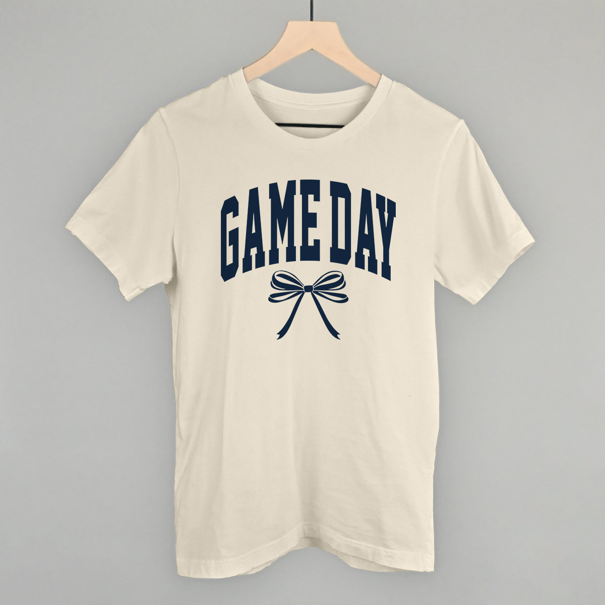 Game Day Arch And Bow Funny T-Shirt in Natural – Ivy + Cloth