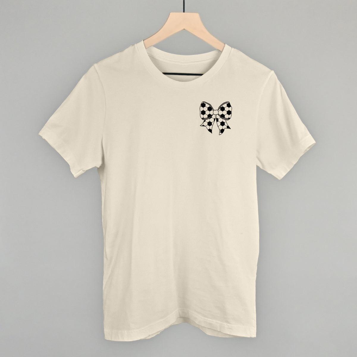 Soccer Bow (Left Chest) Funny T-Shirt in Natural – Ivy + Cloth
