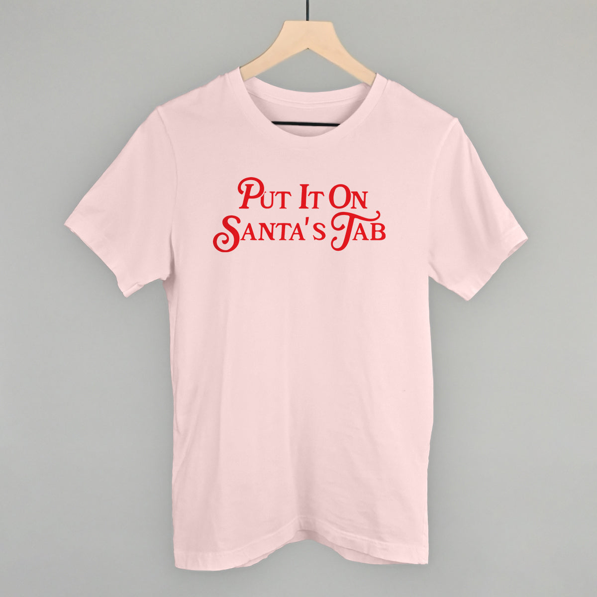 Put It On Santa's Tab (Red) Funny T-Shirt in Soft Pink – Ivy + Cloth