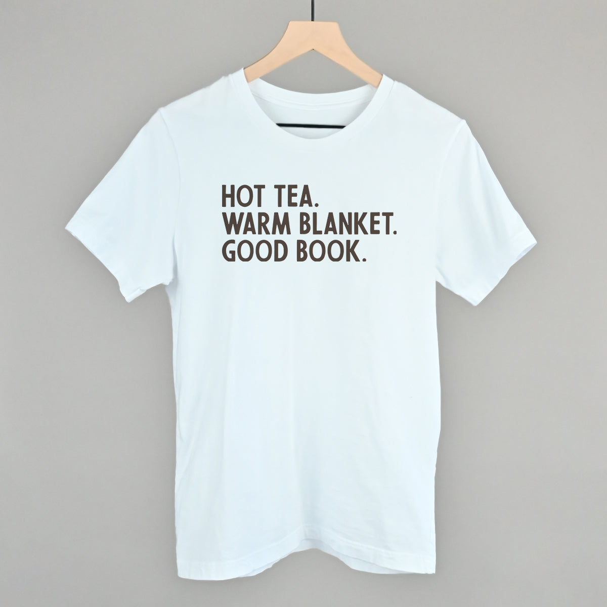 Hot Tea, Warm Blanket, Good Book Cozy graphic tee in White