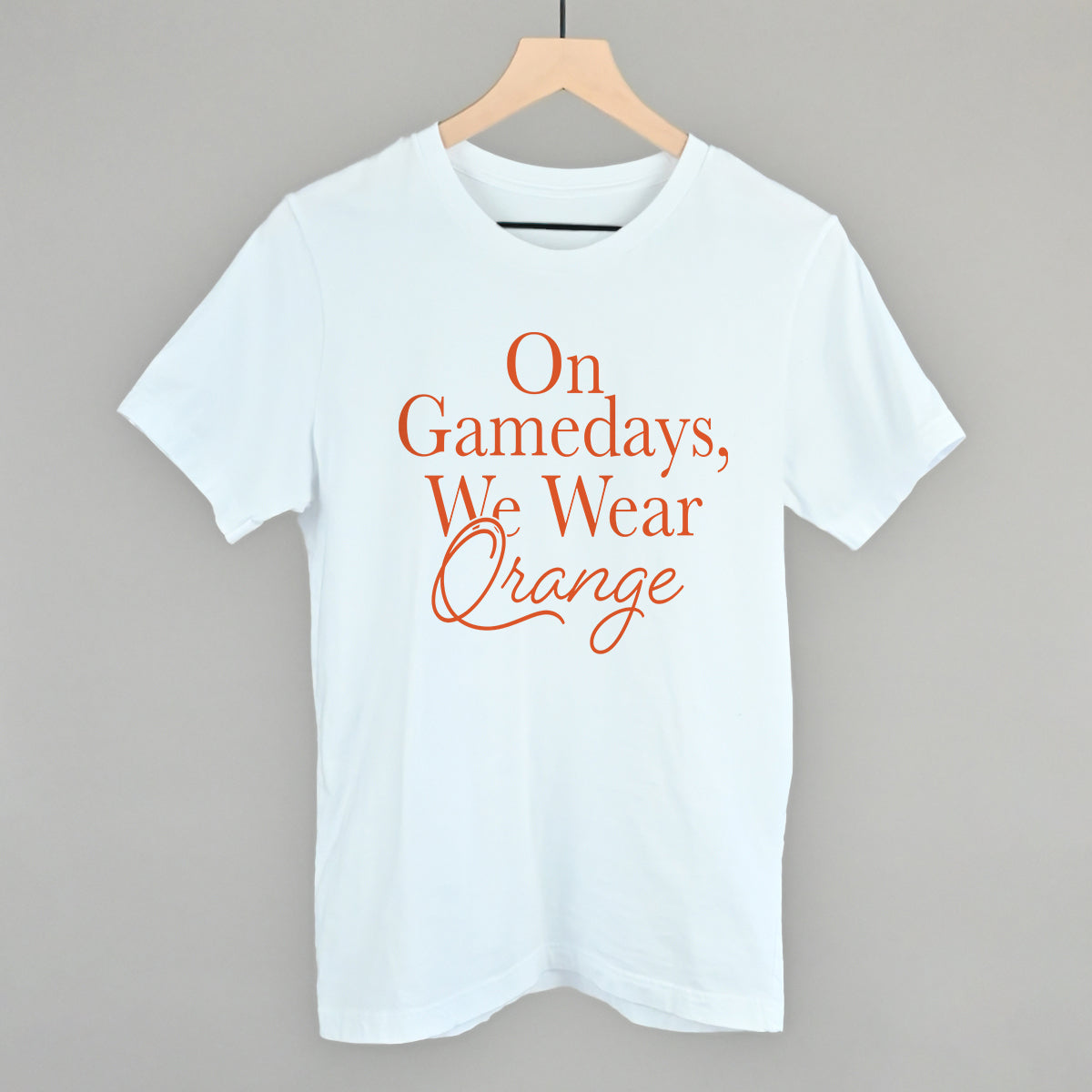 On Game Days We Wear Orange Football graphic tee in White