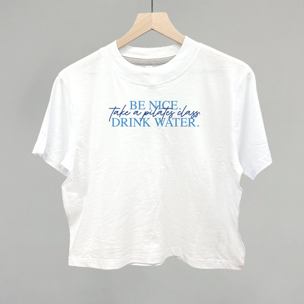 Be Nice, Take A Pilates Class, Drink Water graphic boxy tee in White
