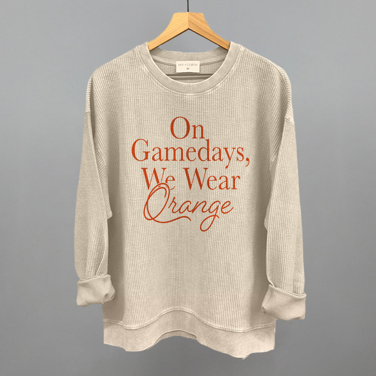 On Game Days We Wear Orange Football graphic oversized corded crew in Moonbeam