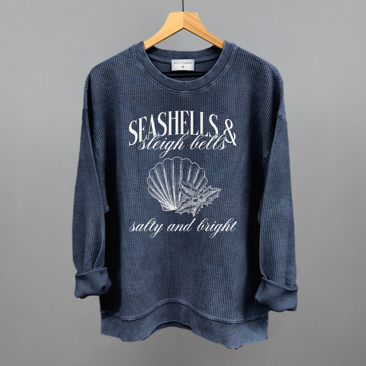 Seashells & Sleigh Bells Coastal Christmas graphic oversized corded crew in Navy