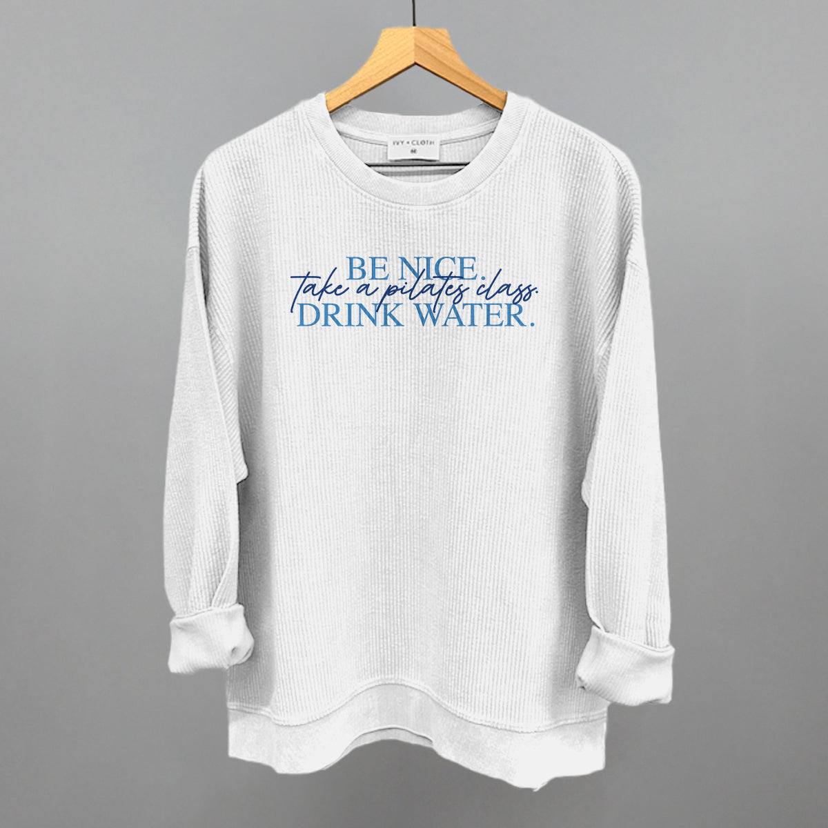 Be Nice, Take A Pilates Class, Drink Water graphic oversized corded crew in White