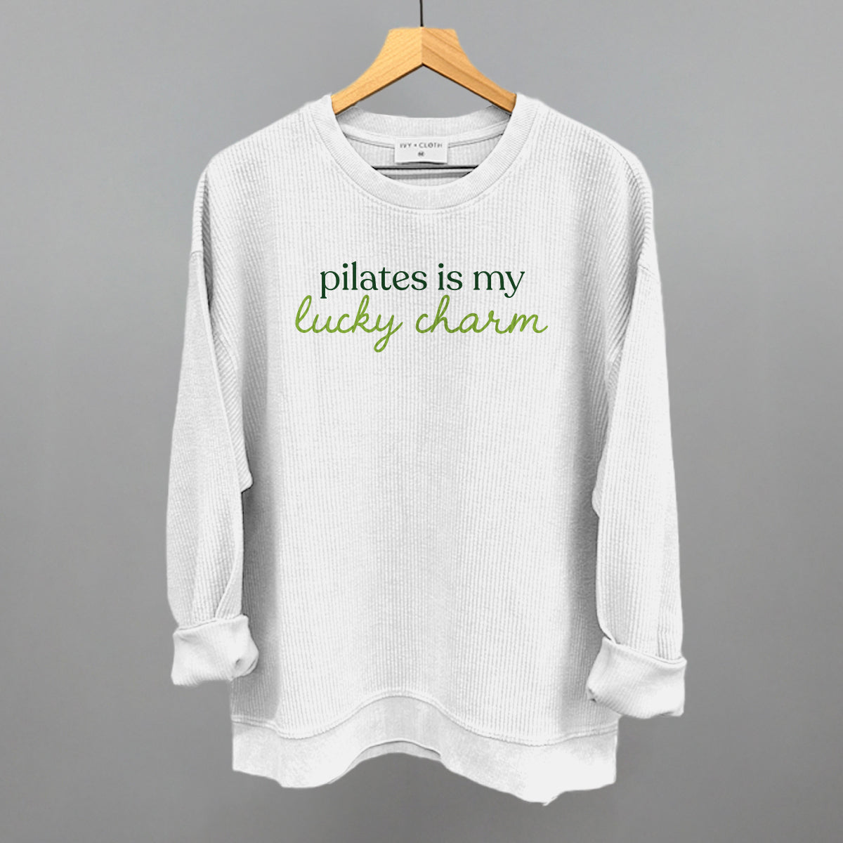 Pilates Is My Lucky Charm St. Patrick's Day graphic oversized corded crew in White