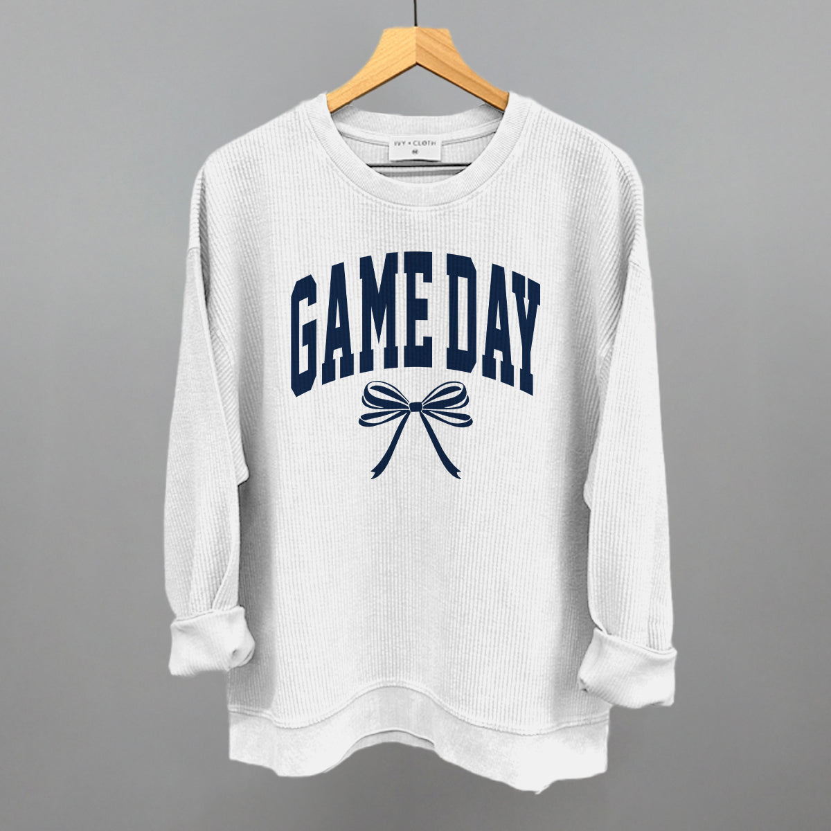 Game Day Arch And Bow Funny Oversized Corded Crewneck Sweatshirt in White – Ivy + Cloth