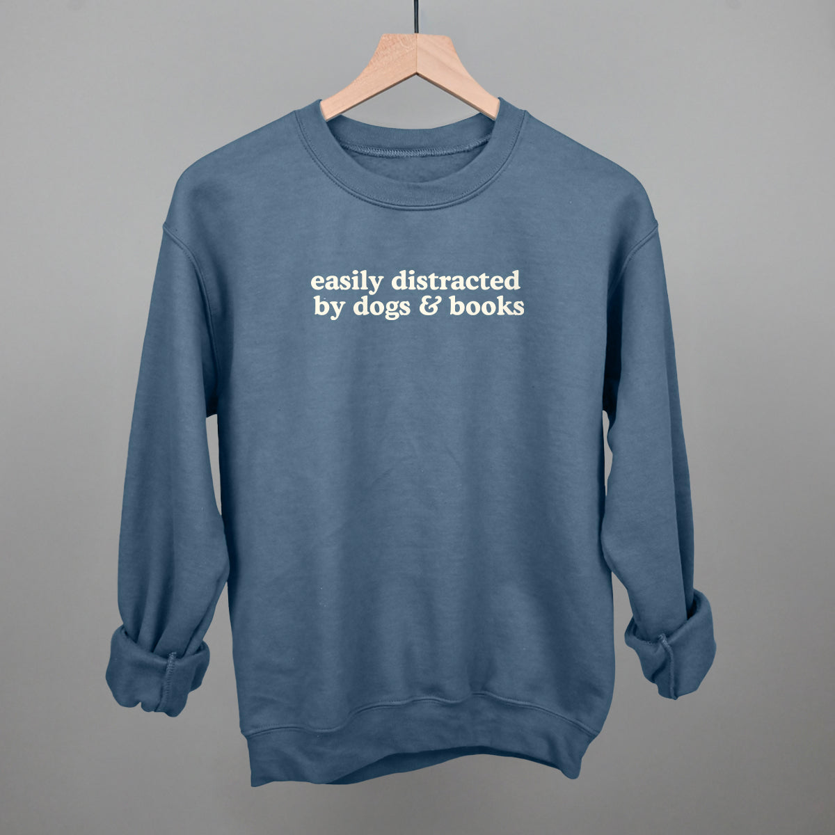 Easily Distracted By Dogs & Books graphic crewneck sweatshirt in Indigo Blue