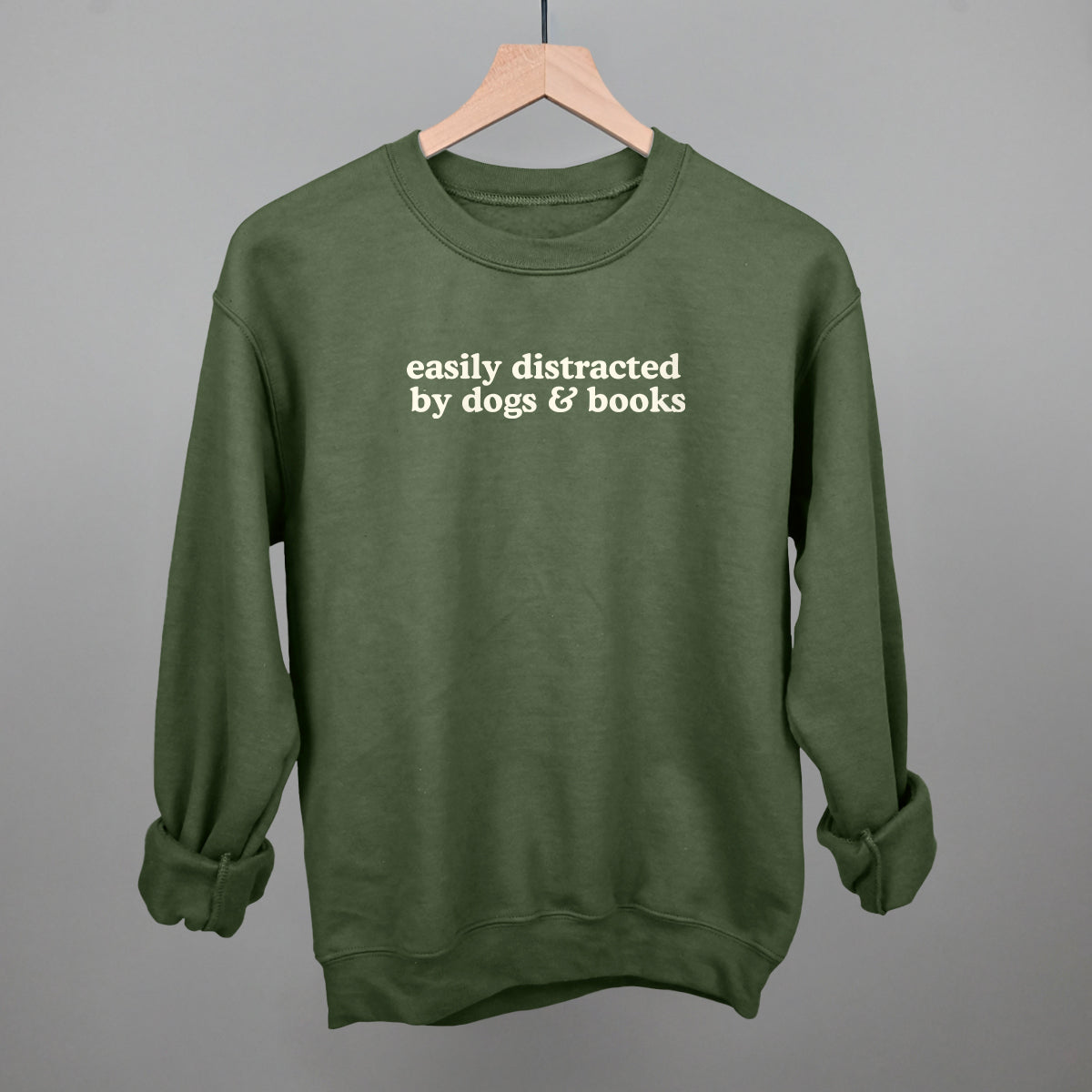 Easily Distracted By Dogs & Books graphic crewneck sweatshirt in Military Green