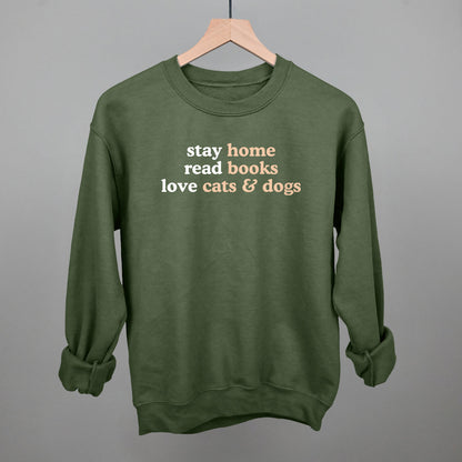 Stay Home Read Books Love Cats & Dogs graphic crewneck sweatshirt in Military Green