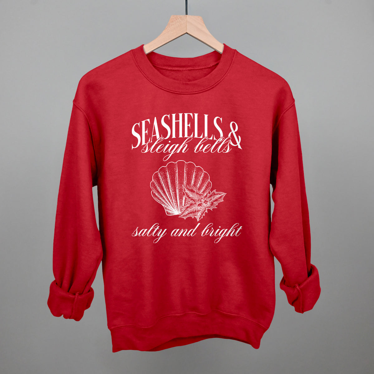 Seashells & Sleigh Bells Coastal Christmas graphic crewneck sweatshirt in Red