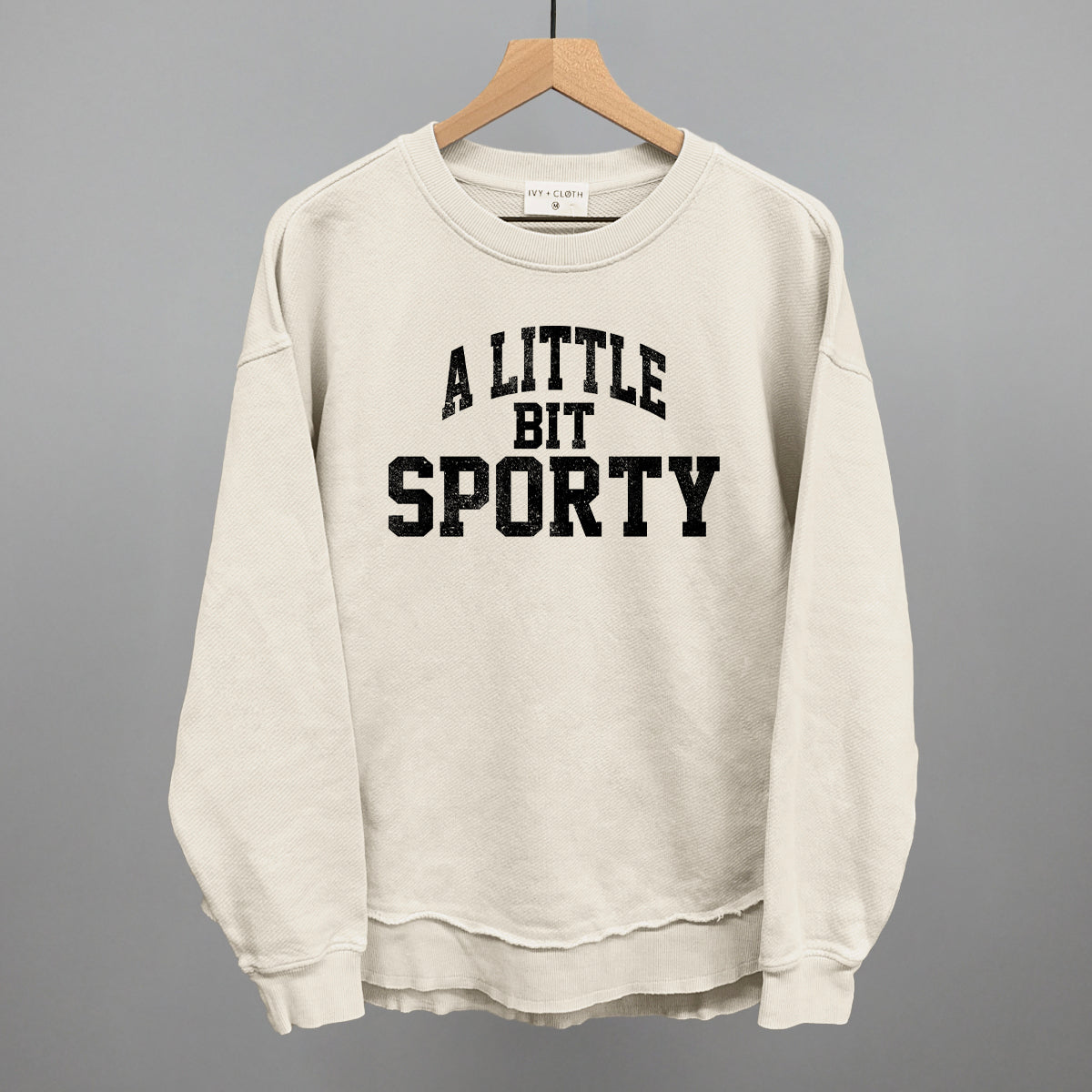 A Little Bit Sporty graphic top in Tapioca