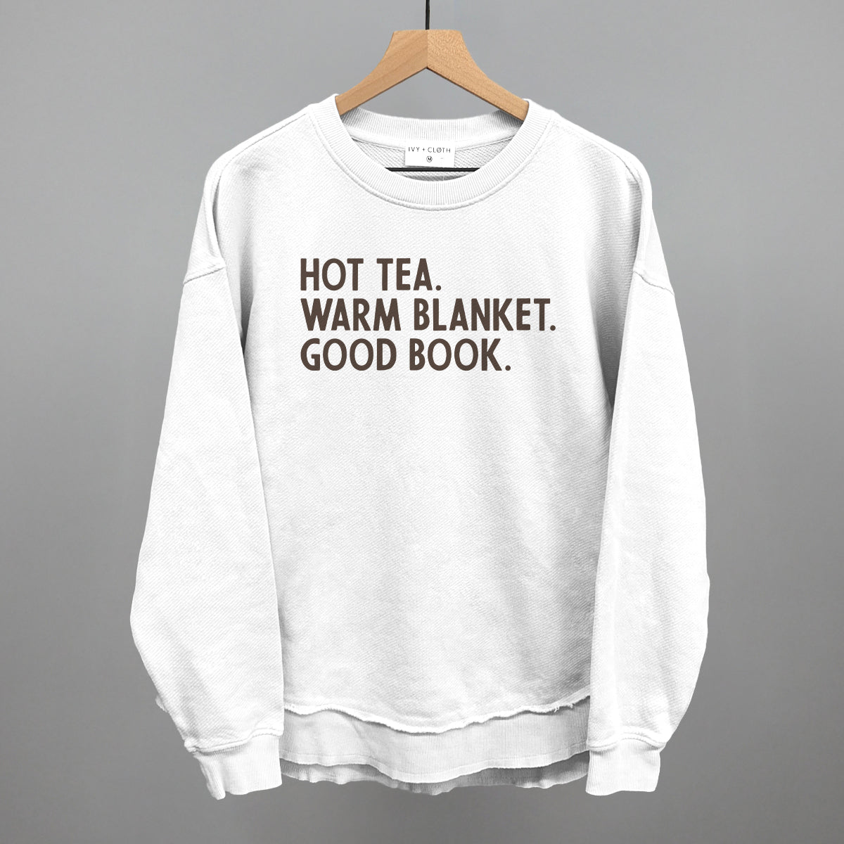 Hot Tea, Warm Blanket, Good Book Cozy graphic top in White