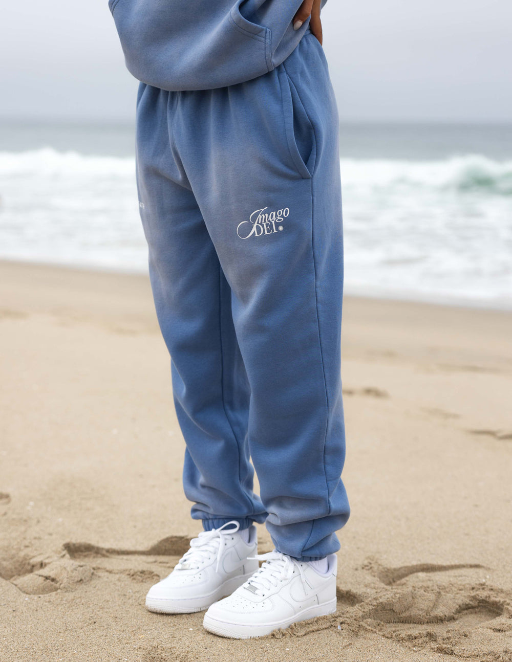 Elevated Faith Blue Sweatpants featuring Imago Dei logo for comfortable Christian Apparel