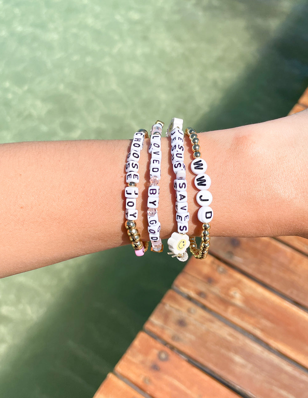Elevated Faith Christian Jewelry Bracelet with letters spelling faith messages on colorful beads