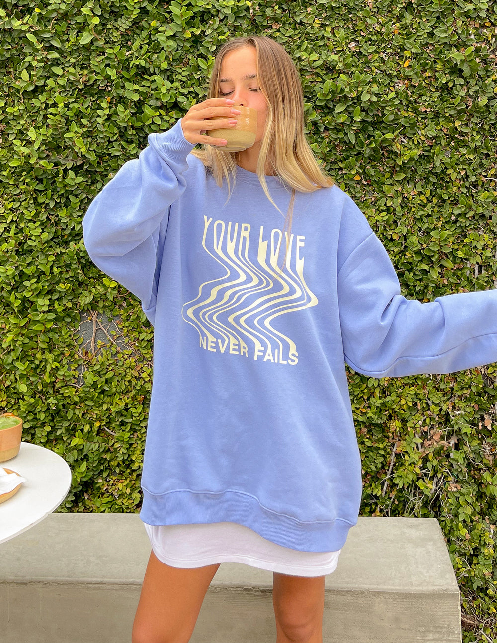 Elevated Faith Christian Crewneck Sweatshirt in light blue with stylish graphic design