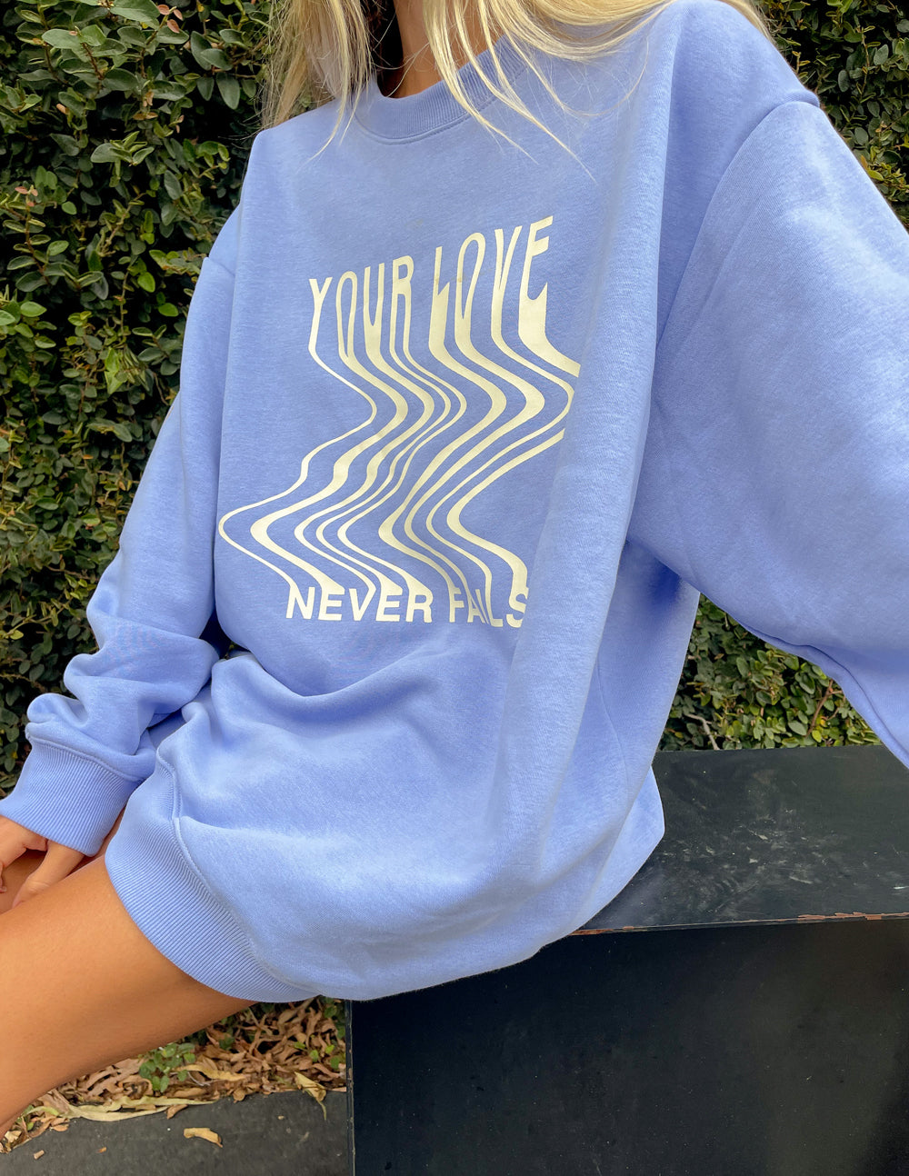 Light blue Christian Crewneck Sweatshirt featuring wavy text and a relaxed fit for comfort and style