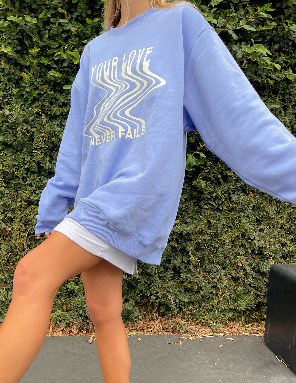 Light blue Christian Crewneck Sweatshirt featuring inspirational design about love.