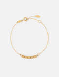 Elevated Faith Christian Jewelry Bracelet with gold chain and beads spelling 'LOVED'