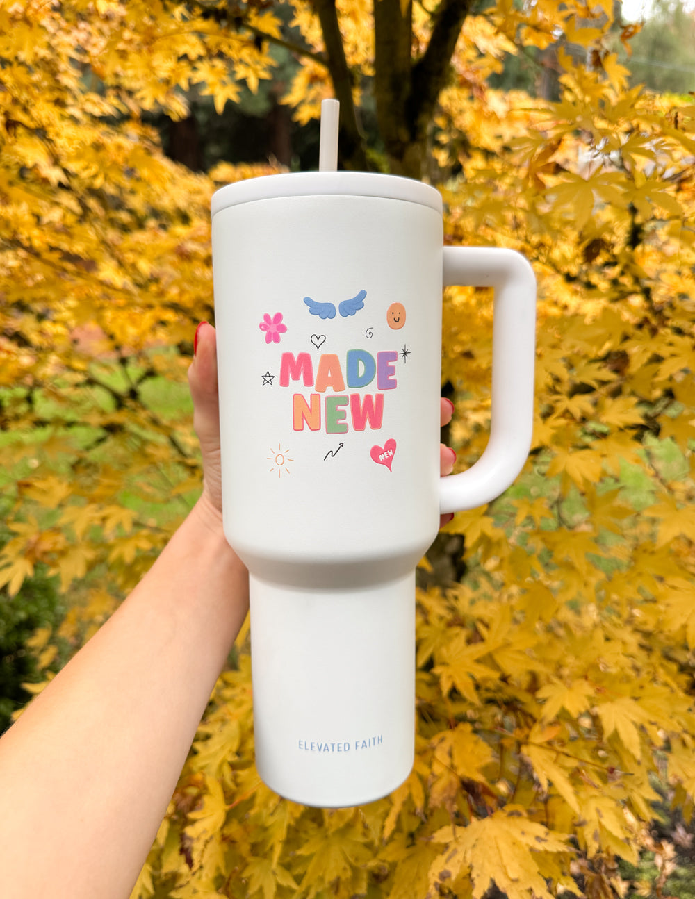 Elevated Faith Made New Tumbler, a colorful Christian Gifts option for hydration on the go