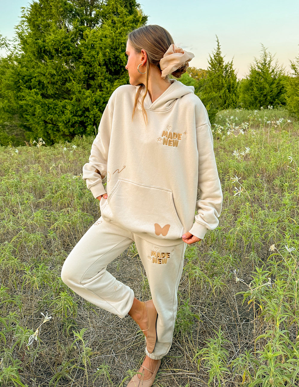 Elevated Faith Women's Sweatpants in Beige featuring butterfly design, perfect for Christian Apparel enthusiasts