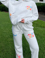 Elevated Faith Made New Sweatpants in Gray featuring colorful graphic designs, perfect for Christian Apparel
