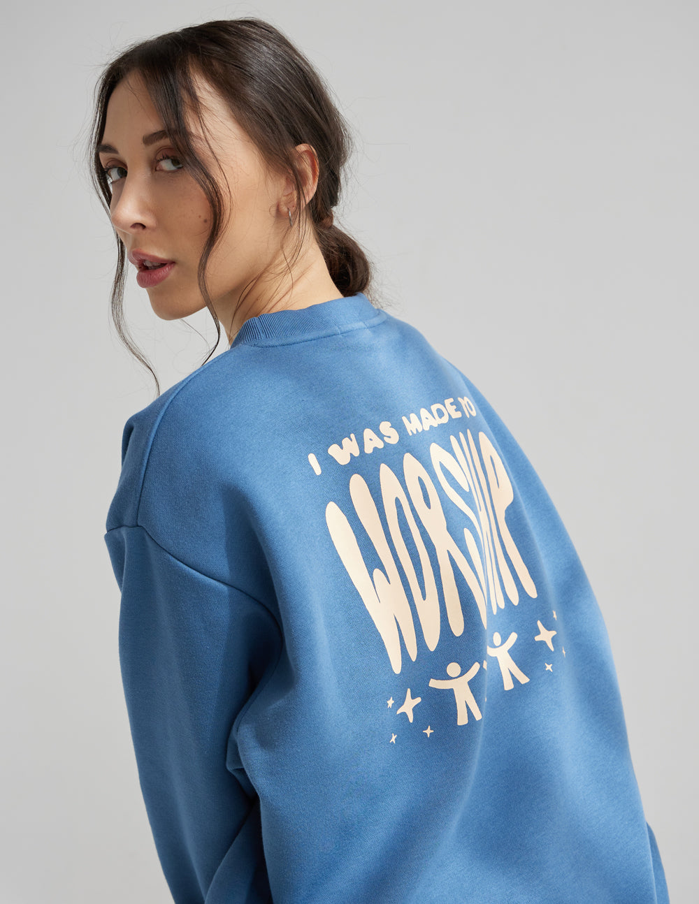 Elevated Faith Christian Crewneck Sweatshirt in Blue with Inspirational 'Worship' Graphic on Back