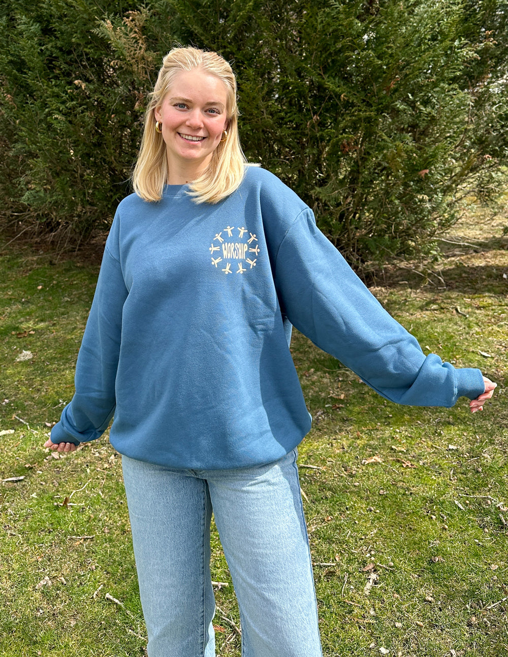 Elevated Faith Christian Crewneck Sweatshirt in blue with a stylish graphic design