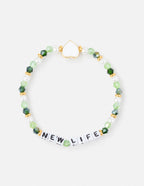 Elevated Faith Christian Jewelry Bracelet with letter beads spelling NEW LIFE and green accents