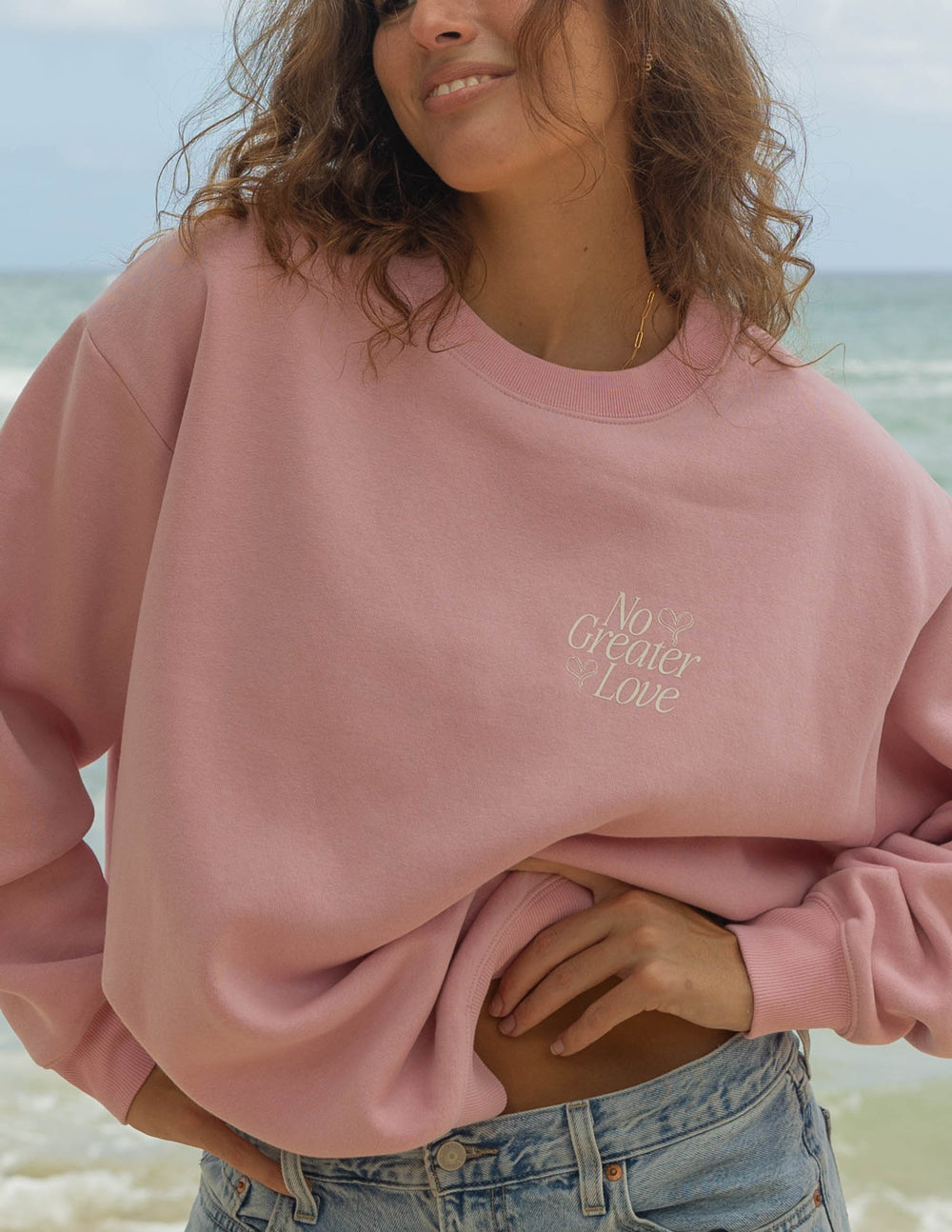 Elevated Faith Christian Crewneck Sweatshirt in Pink with 'No Greater Love' Design for Comfortable Style