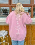 Elevated Faith Christian Crewneck Sweatshirt in pink with unique heart and bow design on the back