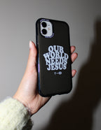 Elevated Faith Christian iPhone Case featuring 'Our World Needs Jesus' design on a sleek black background