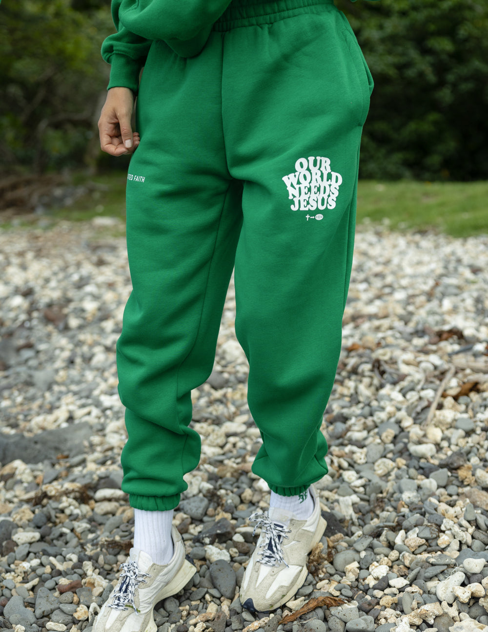 Elevated Faith Green Sweatpants with 'Our World Needs Jesus' Graphic, Perfect for Christian Apparel