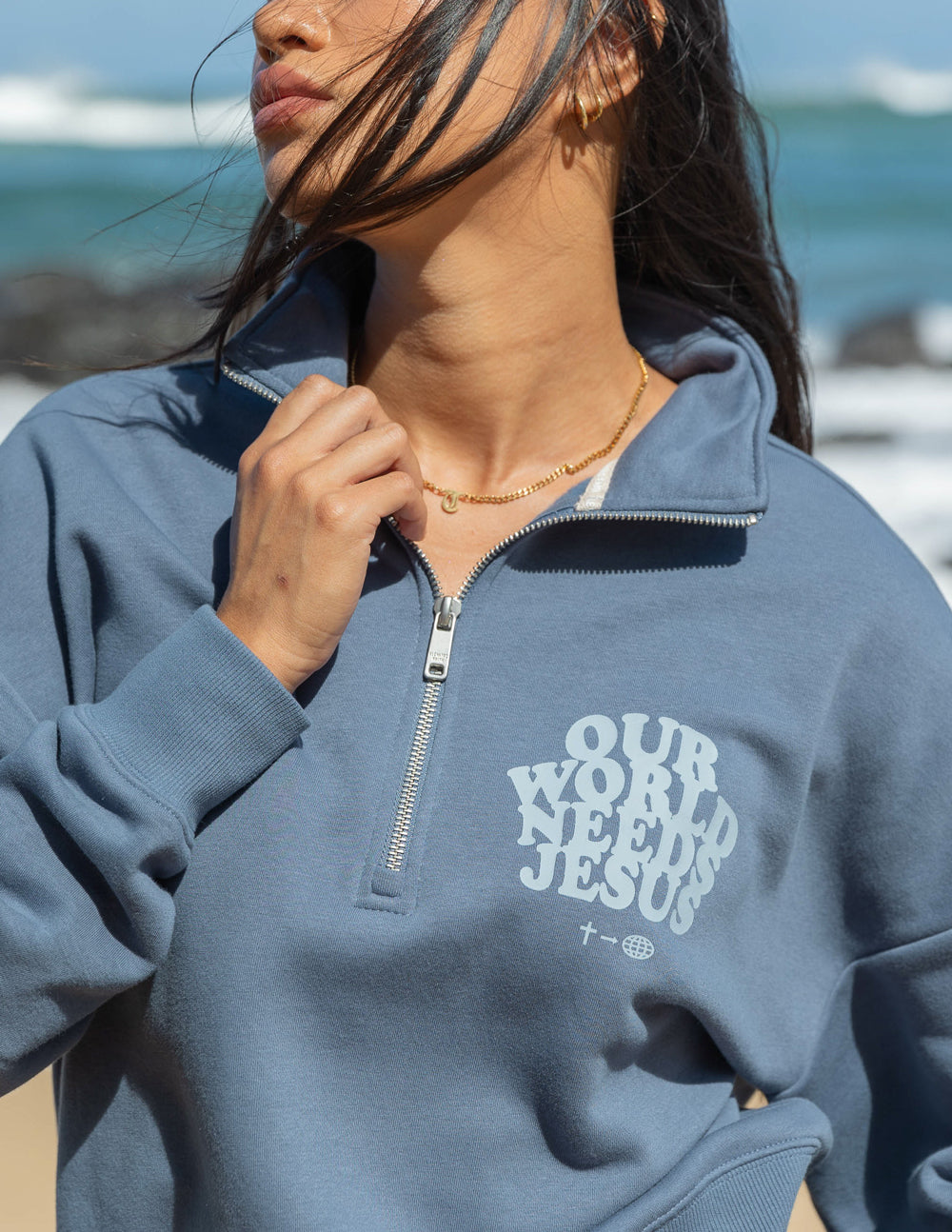 Elevated Faith Christian Jacket in Blue featuring 'Our World Needs Jesus' graphic for casual wear