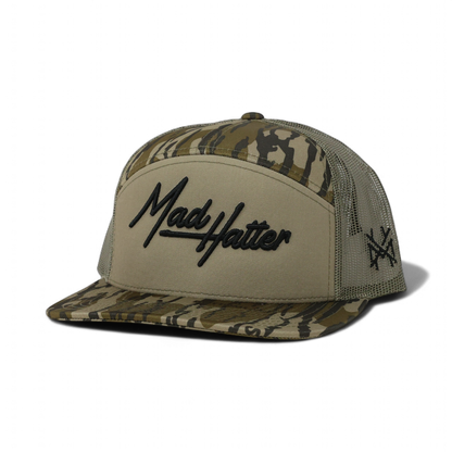 The Mad Hatter Co. Legacy Funny Embroidered Trucker Hat in 7 Panel Bottomland/Loden – Ivy + Cloth