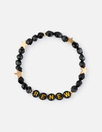 Elevated Faith Christian Jewelry Bracelet with black beads and gold stars spelling RENEW