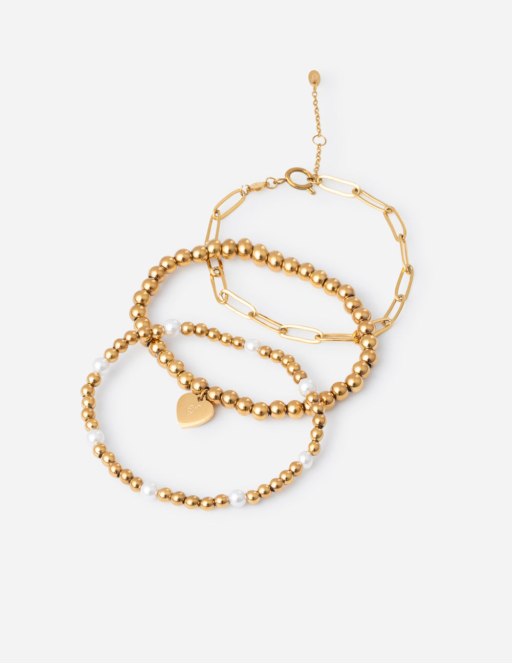 Elegant Christian Jewelry Bracelet set featuring gold beads and a heart charm for stylish faith expression